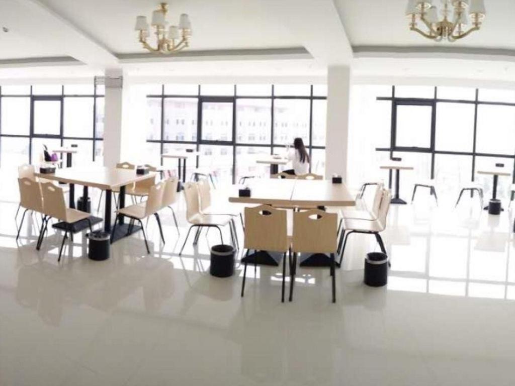 Greentree Inn Zhengzhou Xinzheng City Longhu Town Xiangyun Road Express Hotel Esterno foto