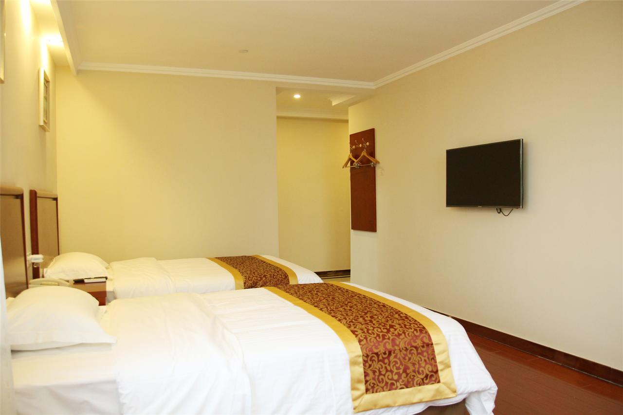 Greentree Inn Zhengzhou Xinzheng City Longhu Town Xiangyun Road Express Hotel Esterno foto