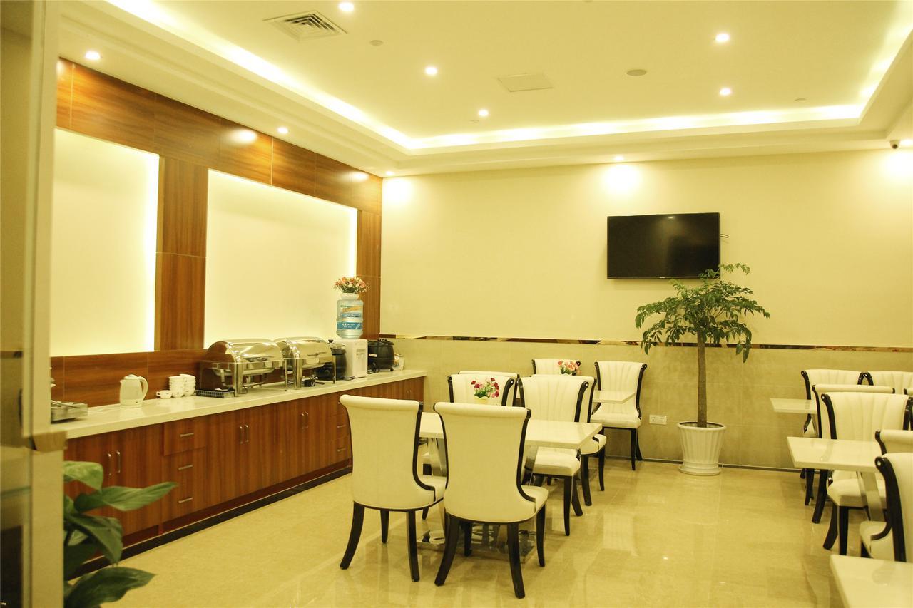 Greentree Inn Zhengzhou Xinzheng City Longhu Town Xiangyun Road Express Hotel Esterno foto