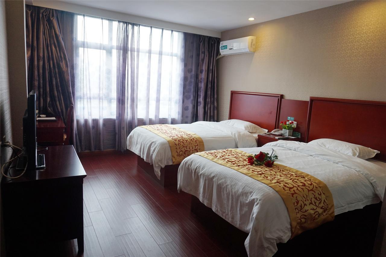Greentree Inn Zhengzhou Xinzheng City Longhu Town Xiangyun Road Express Hotel Esterno foto