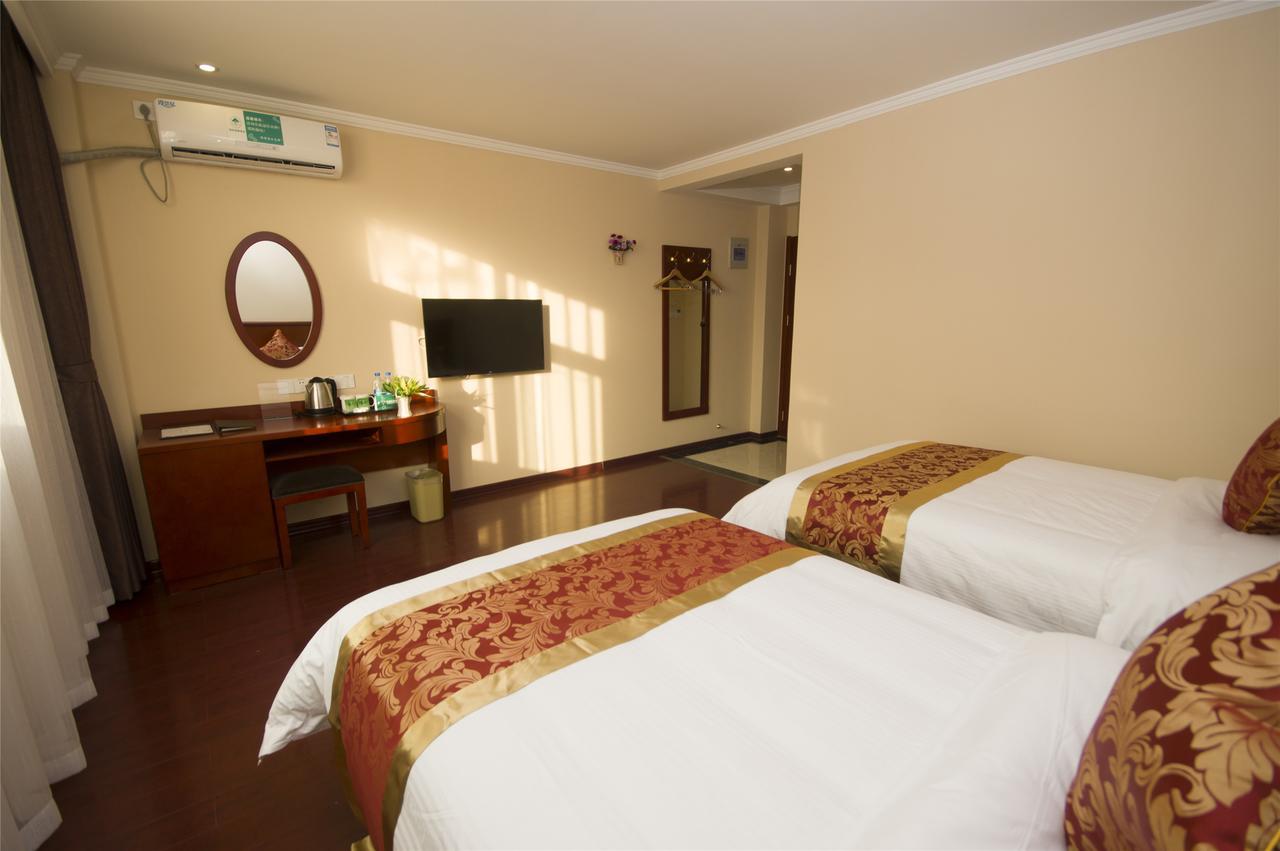 Greentree Inn Zhengzhou Xinzheng City Longhu Town Xiangyun Road Express Hotel Esterno foto